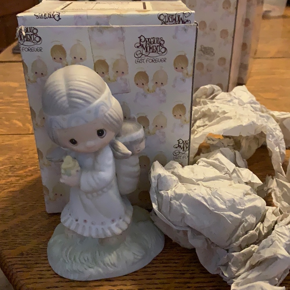 Precious Moments figurine ‘His burden is light.’